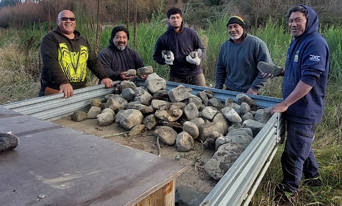 Collecting stones from the Manwatū river